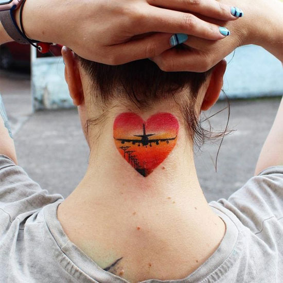 Sunset heart tattoo on neck