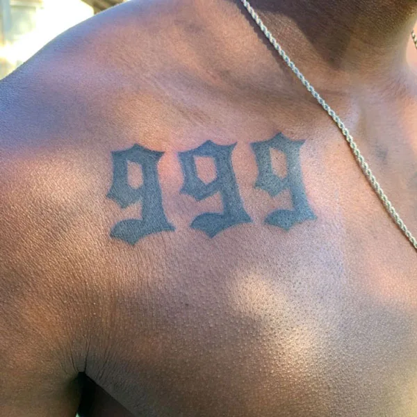 999 tattoo on chest 2