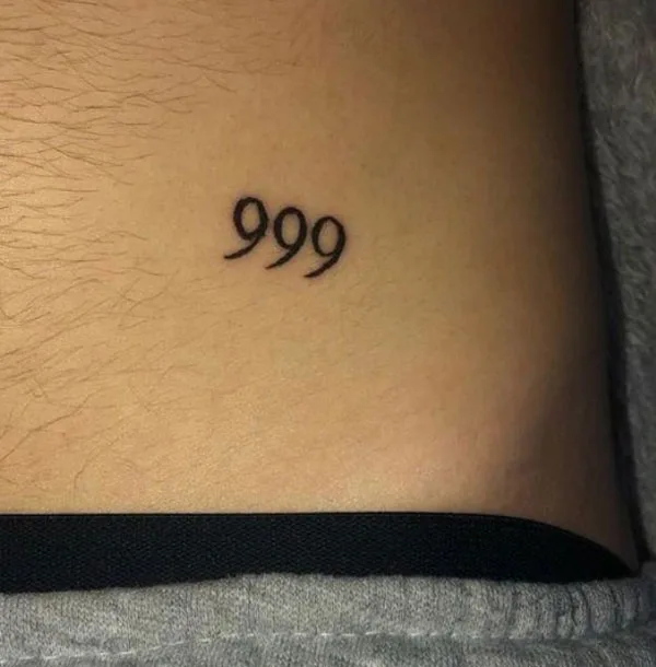 Small 999 tattoo 2