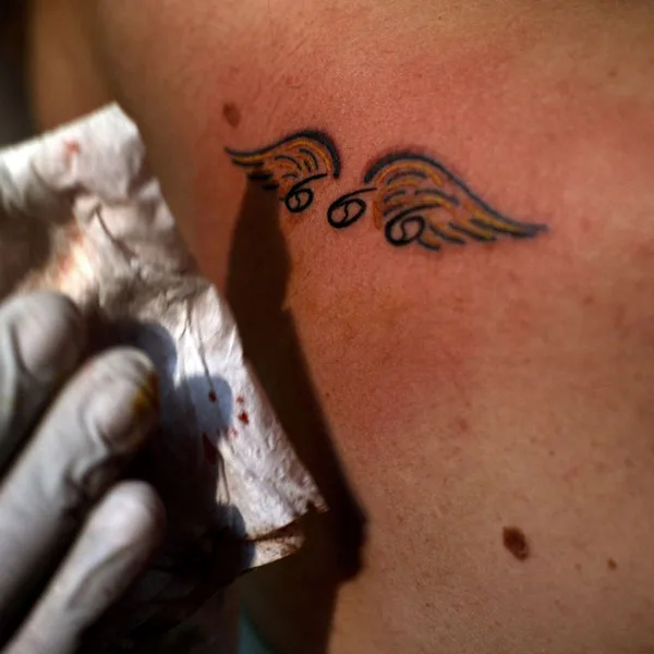 666 wings tattoo