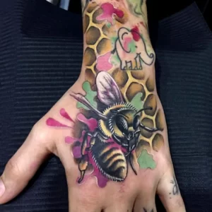 Bee hand tattoo 1