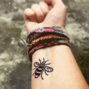 Bee wrist tattoo 1