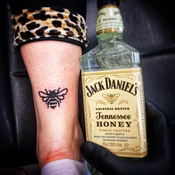 Jack Daniels honey bee tattoo