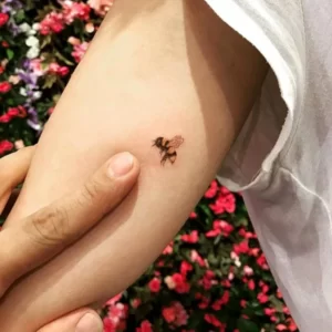 Small bee tattoo 1