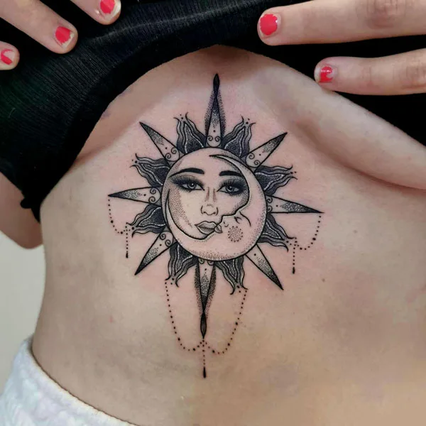 Sun and moon under breast tattoo