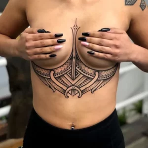 Tribal tattoo under breast 1