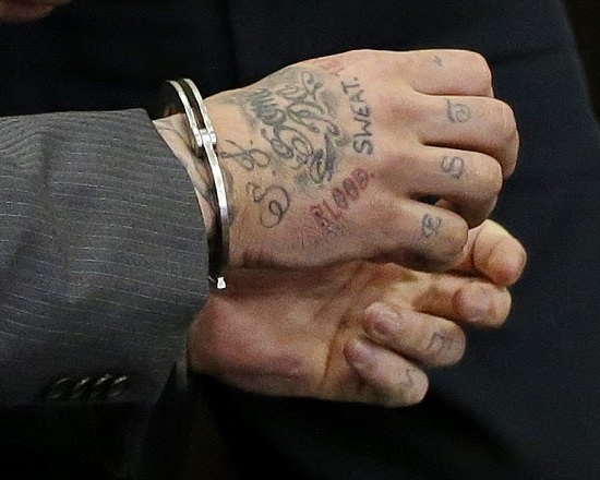 Blood gang tattoo on hand