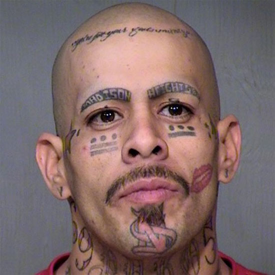 blood gang face tattoo