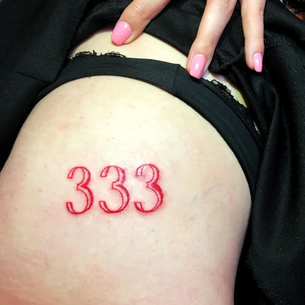 333 tattoo on thigh