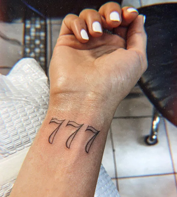 777 tattoo 92