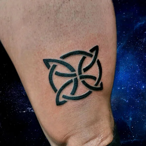Above knee celtic tattoo