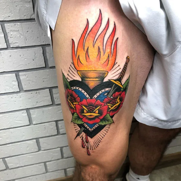Above knee traditional tattoo