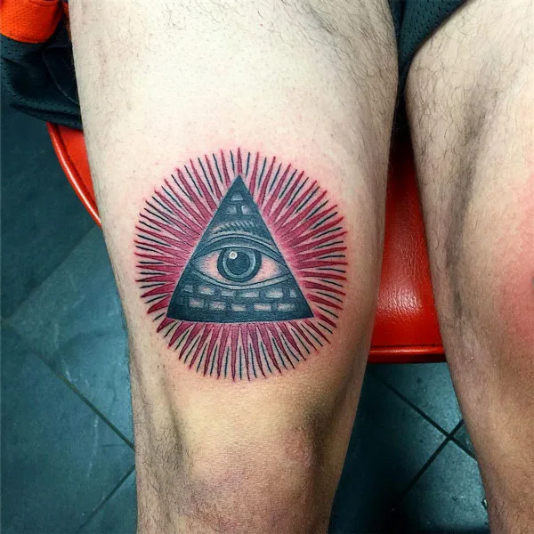 Eye of Providence above knee tattoo