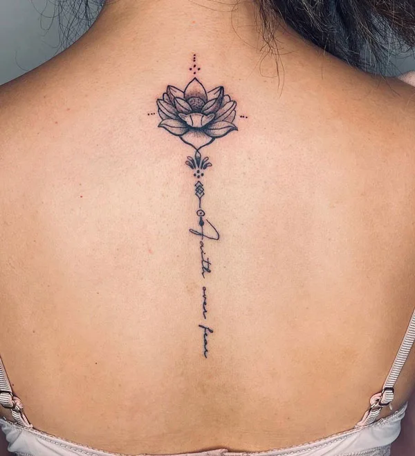 Faith over fear tattoo spine