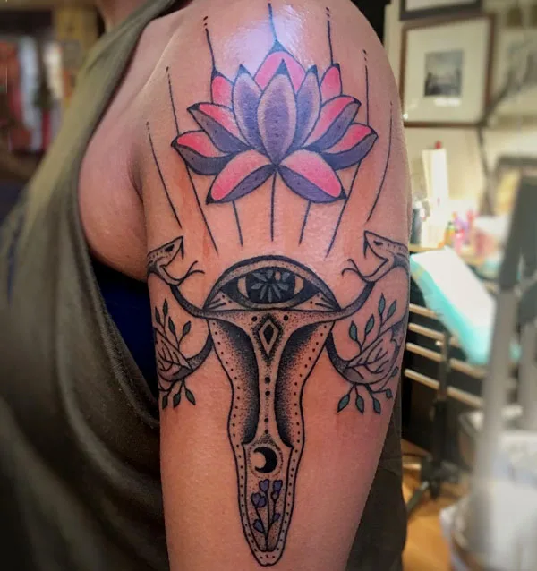 Lotus womb tattoo