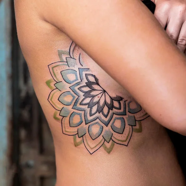 Mandala side boob tattoo