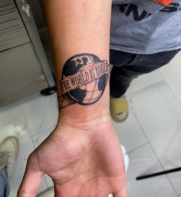 Scarface globe tattoo