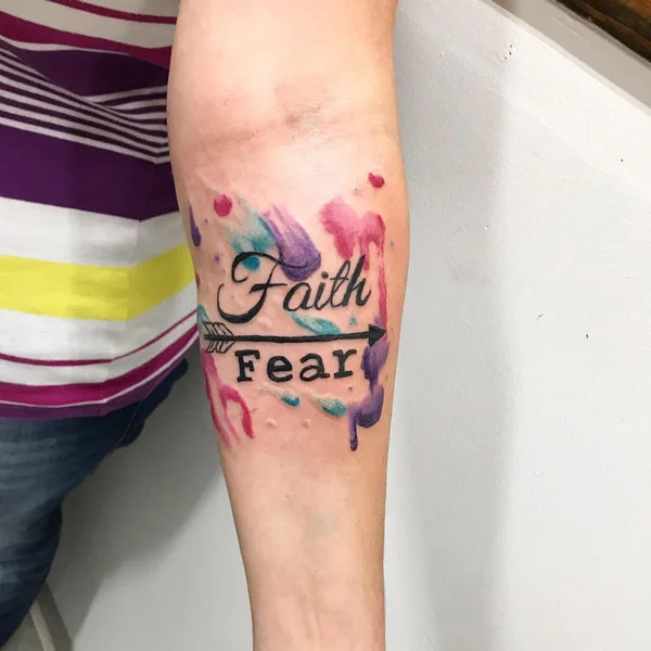 Watercolor faith over fear tattoo
