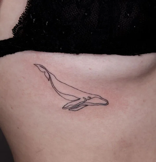 Whale side boob tattoo