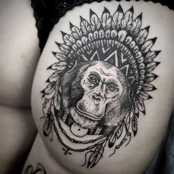 Monkey butt tattoo