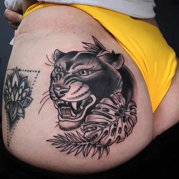 Panther tattoo on butt