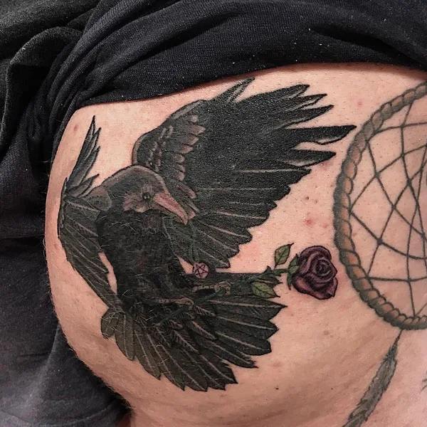Raven butt tattoo