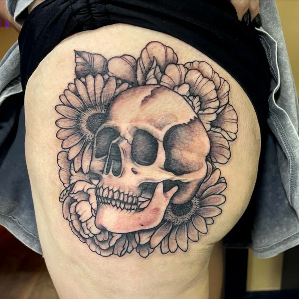 Skull butt tattoo