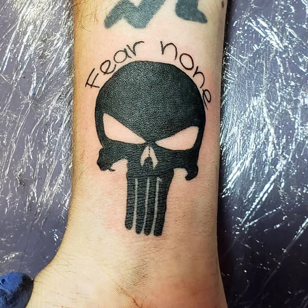 Skull fear none tattoo