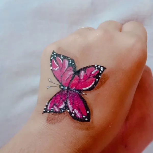 3D butterfly hand tattoo