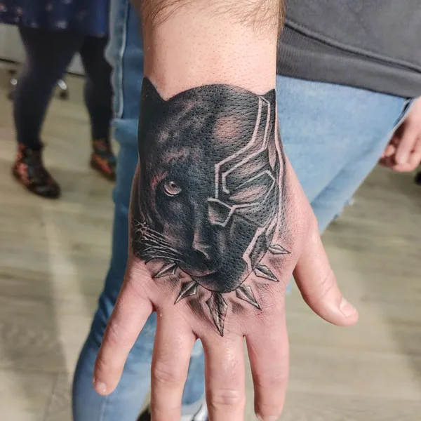 Black panther hand tattoo