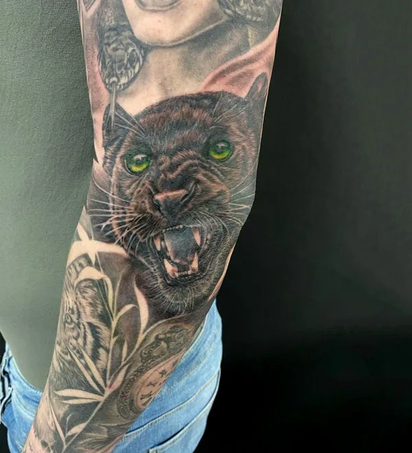Black panther sleeve tattoo