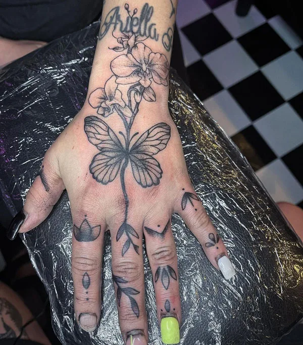Butterfly hand tattoo 10