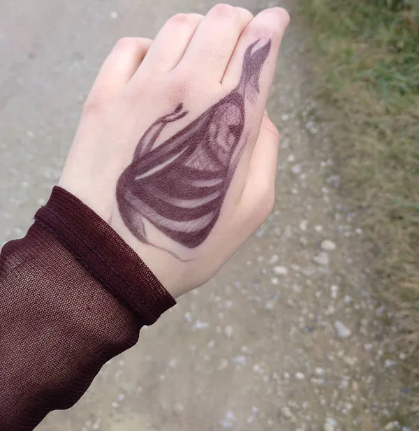Butterfly hand tattoo 23