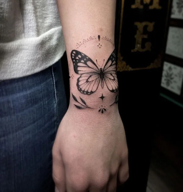 Butterfly hand tattoo 24