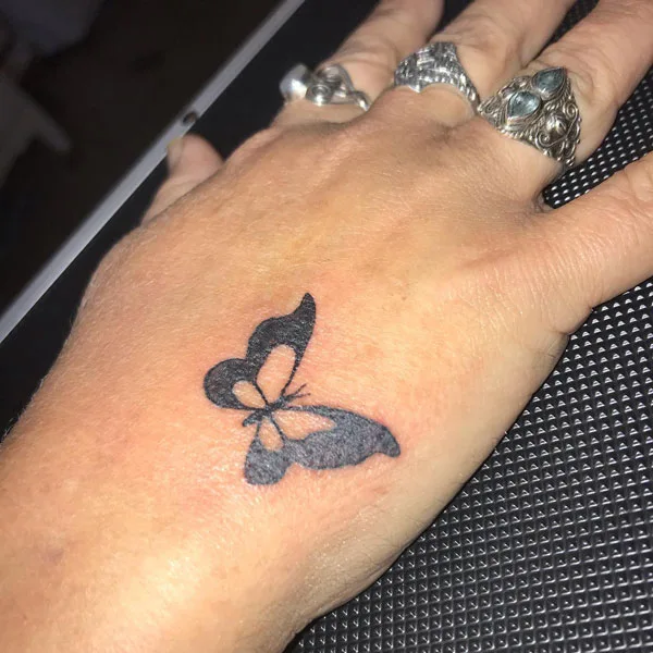 Butterfly hand tattoo 35