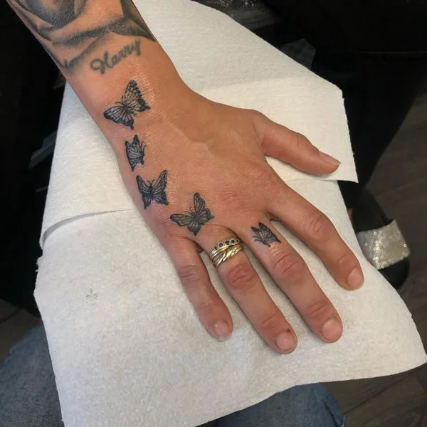 Butterfly hand tattoo 39
