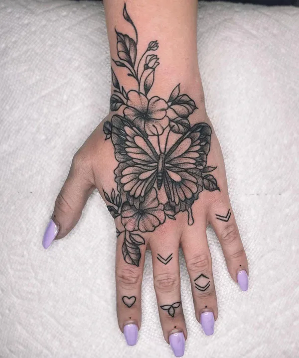 Butterfly hand tattoo 45