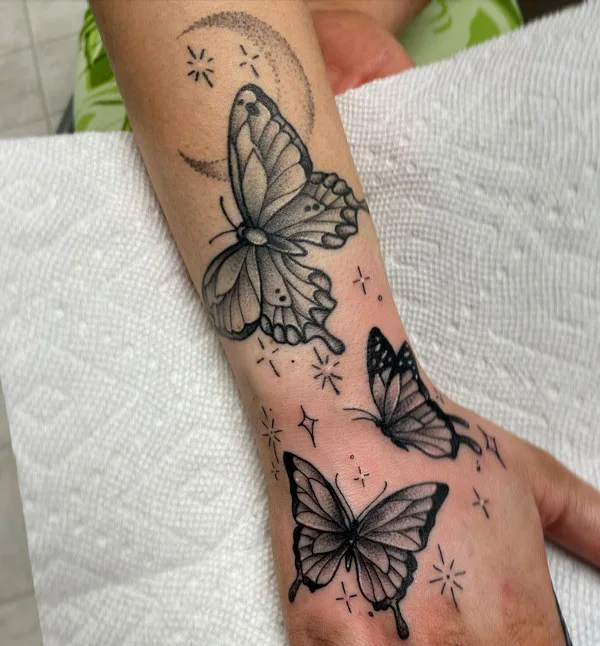 Butterfly hand tattoo 47