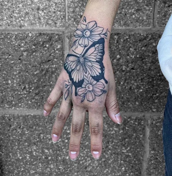 Butterfly hand tattoo 49