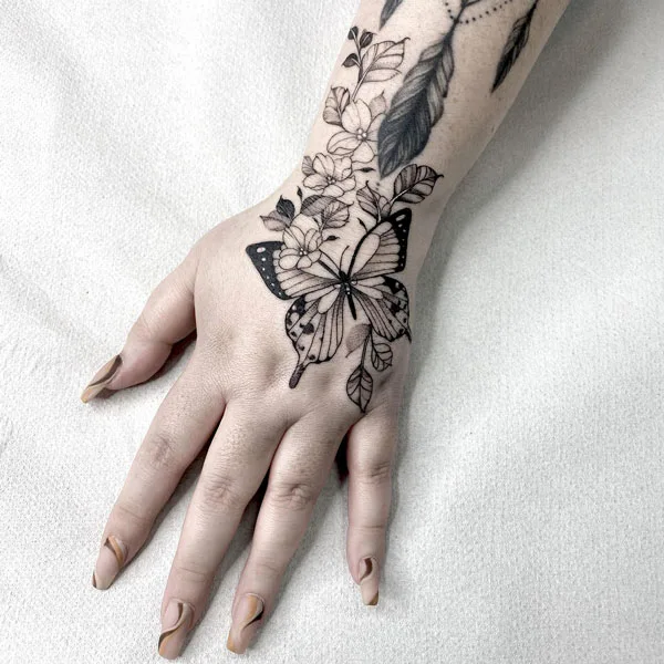 Butterfly hand tattoo 5