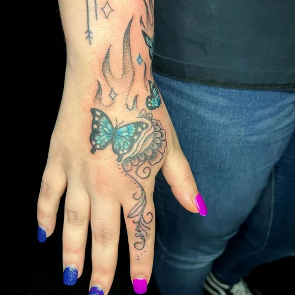 Butterfly hand tattoo 55