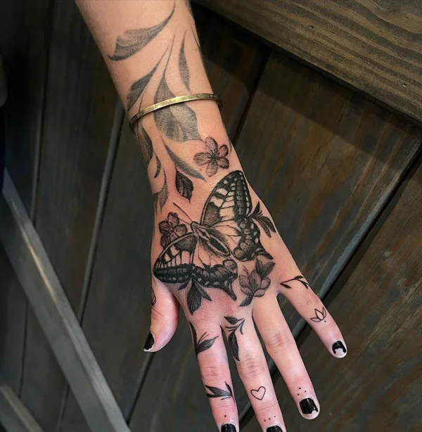 Butterfly hand tattoo 66