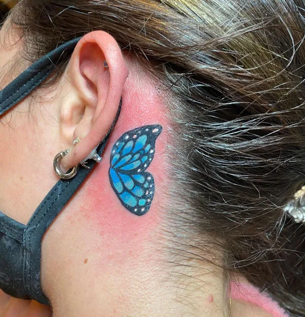 Butterfly tattoo behind ear 14