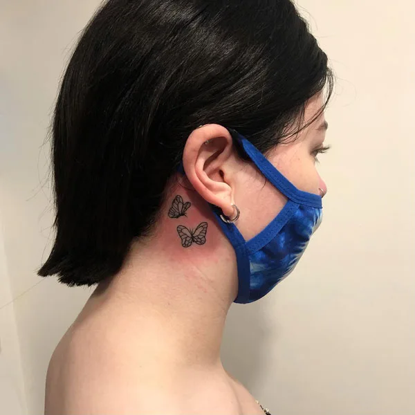 Butterfly tattoo behind ear 22
