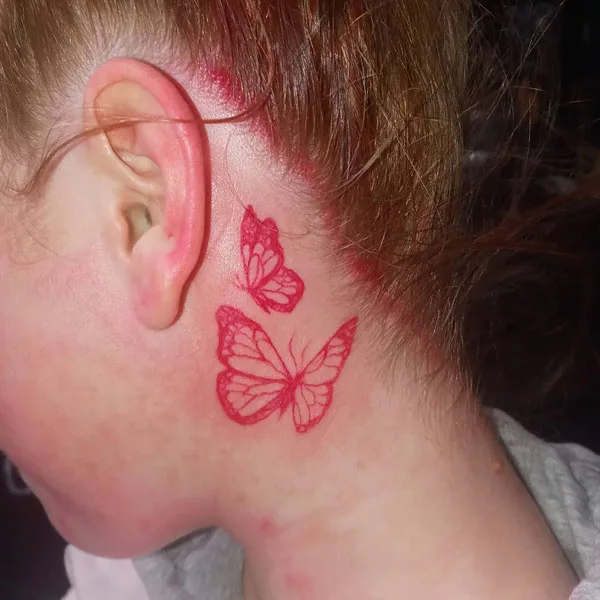 Butterfly tattoo behind ear 31