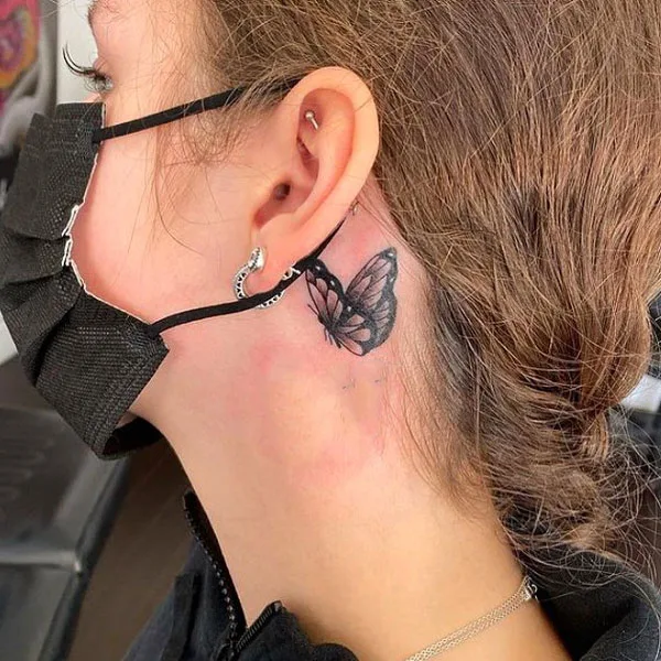 Butterfly tattoo behind ear 36
