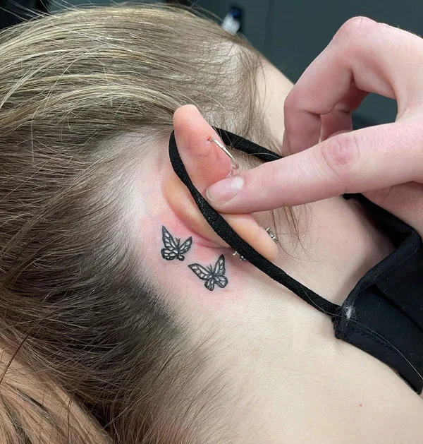 Butterfly tattoo behind ear 47