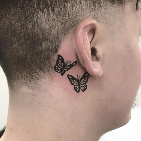 Butterfly tattoo behind ear 5