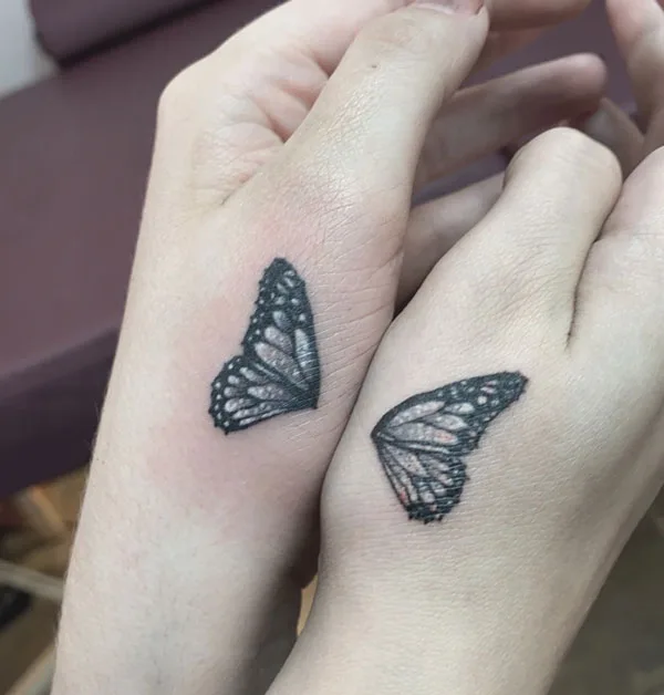 Butterfly wings hand tattoo