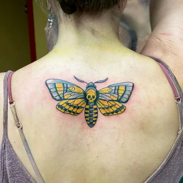 Death moth tattoo 6